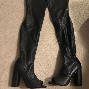 Thigh high leather stretch boots
